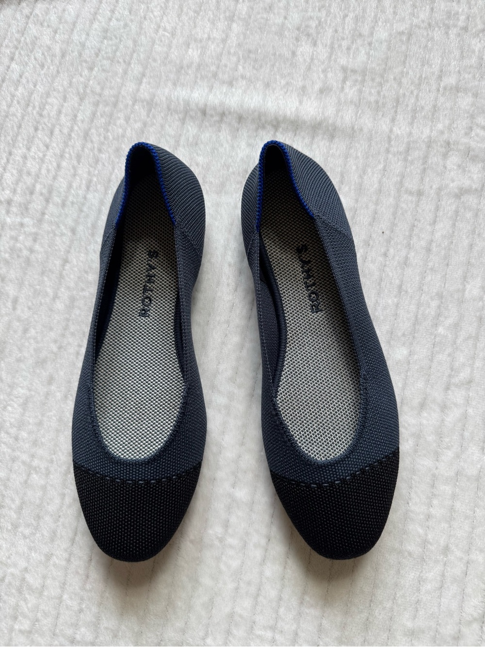 Rothy's Navy and Black Pointed Toe Flats